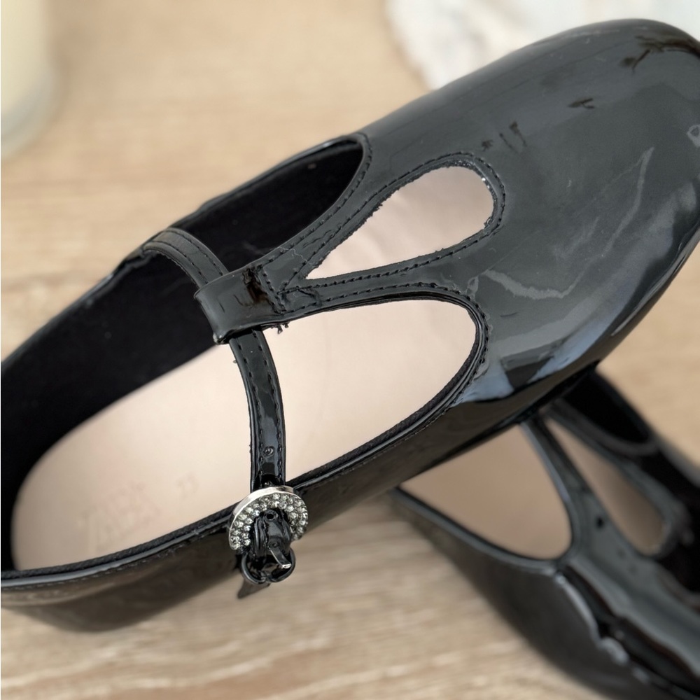 Girls black T-strap shoes